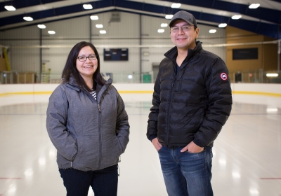 Tournament organizers, Shera Wesley and Chris Lawson, at the Lac Seul Arena. Not pictured is committee member Sol Mamakwa. Photo by Blue Earth Photography